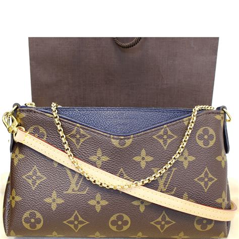 louis vuitton clutch bag.